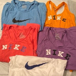 5 different colored tanks.  Al Nike